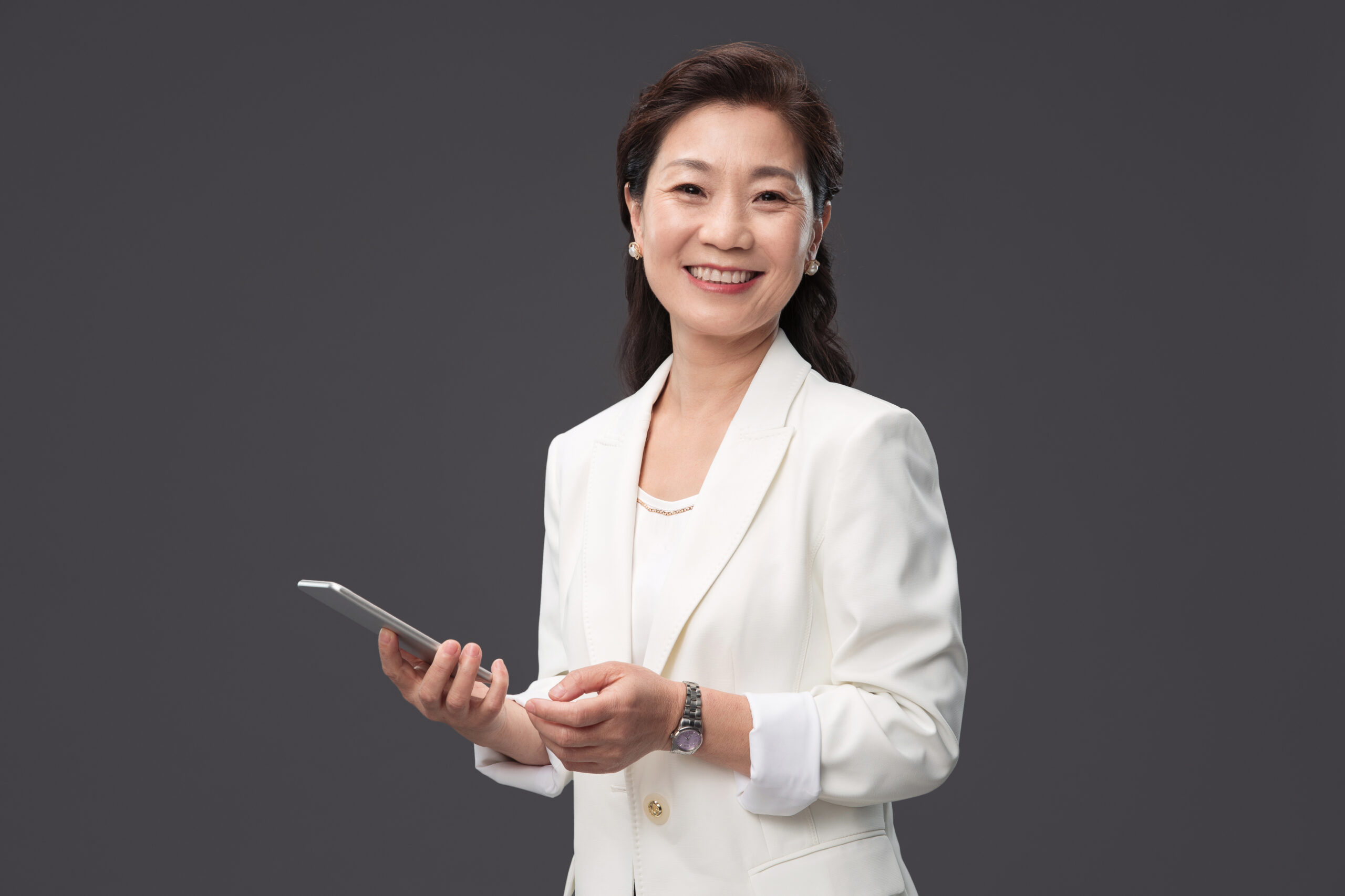 holding a cell phone business woman
